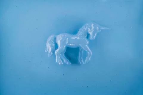 Unicorn on blue background Stock Photos