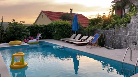 A unicorn float is in the water of the swimming pool Stock Footage 268852382