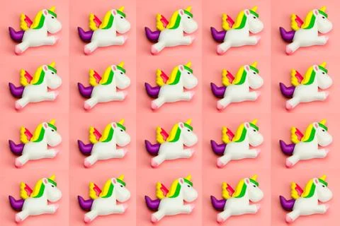 Unicorn toy pattern on a pink background Stock Photos