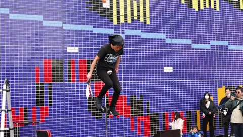 Unicycle Knife-Throwing Performance Stock Footage 288969367