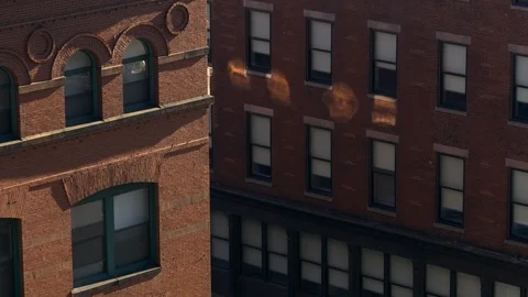 Unidentifiable office windows in old red brick building, Boston, Massachusetts. Stock Footage 127327645