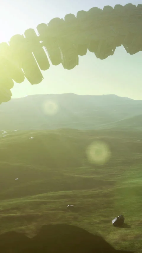 Unidentified alien ship hovers over mountainous terrain during bright sunset Stock Footage 329136217