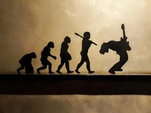 Unidentified draw on the mall. Image evolved from ape to guitarist Stock Photos