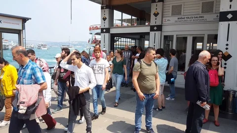 Unidentified people getting out of the ferry boat at Besiktas Pier Stock Footage 104490458