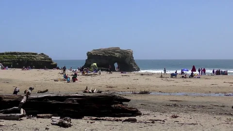 Unidentified people at the Natural Bridges State Beach Stock Footage
