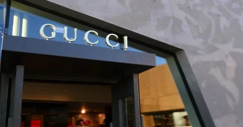 Unidentified People Walk Near Gucci Shop 4k Stock Footage