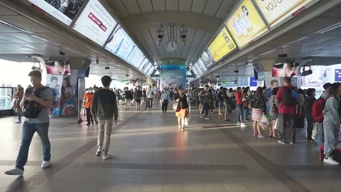 Unidentified peoples at BTS skytrain junction in service Stock Footage 84145381