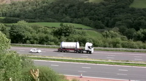 Unidentified white intermodal tanker going south on the M6 near Tebay, Cumbria. Stock Footage 41797356