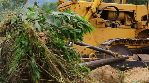 Unidentified worker control Bulldozer to excavator grader removing the ground Video stock 50525930