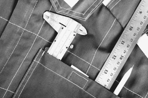Uniform and construction tools, top view, flat lay. Tools sailing and worke.. Stock Photos