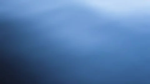 Uniform Blurred Surface of Dark Blue Water With Slight Oscillation Stock Footage 247912222