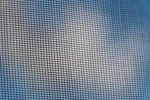 Uniform Mesh Screen with Dynamic Texture and Light Play Stock Photos