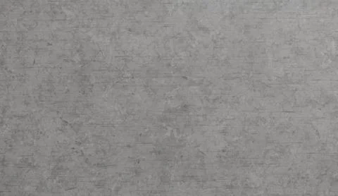 A uniform, rough grey textured background with subtle horizontal linear pat.. Stock Photos