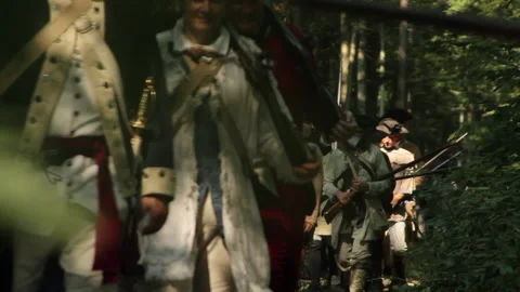 Uniformed Rev War Re-enactor Soldiers Marching with flintlocks Stock Footage 170452317