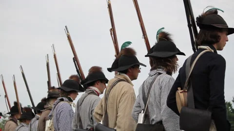 Uniformed Rev War Re-enactor Soldiers Stand with flintlocks Stock Footage 170500404
