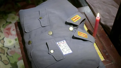 Uniforms and a gun Stock Footage 235267901
