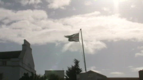 Union Jack British Flag Blowing In The Wind On Cloudy Day Stock Footage 279261