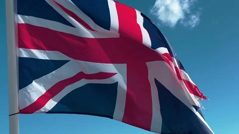 Union Jack flag blowing in the wind Stock Footage 219221989