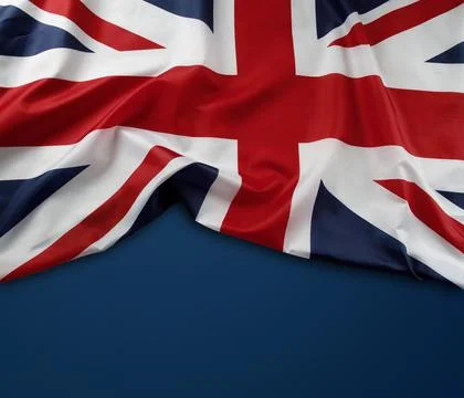 Union Jack flag on blue background Stock Photos