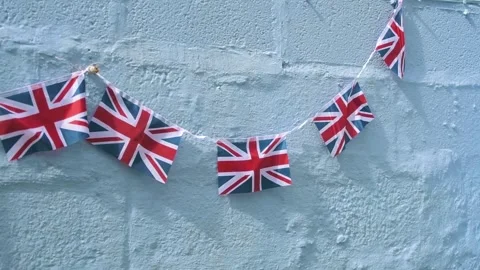Union Jack flag  bunting  flying coronation oyaly  paitriotism Stock Footage 240418547