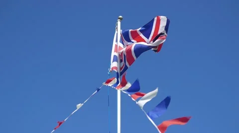 Union Jack flag flutters in wind Stock Footage 64385065