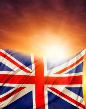 Union jack flag in front of bright sky Stock Photos