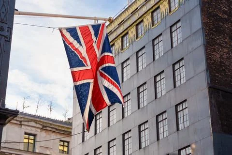 Union Jack Flag Hanging On London Street Фото