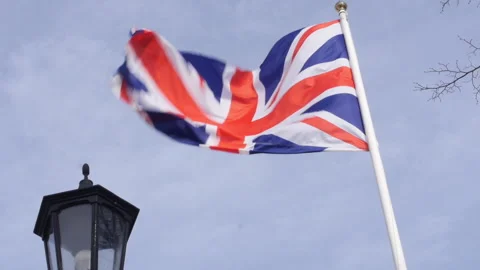 Union Jack On A Flag Pole Waving In The Wind Stock-Footage 149156219