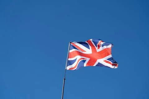 Union Jack Flag, Union Flag, Flag of the United Kingdom waving in the wind Stock Photos