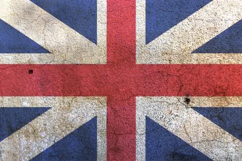 Union Jack flag on the white wall background Stock Photos