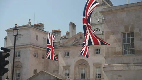 Union Jack flags and horse guard at Dover House, London, England Stock Footage 243036962