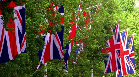 UNION JACK FLAGS BLOWING THE MALL LONDON ENGLAND Stock Footage 67105996