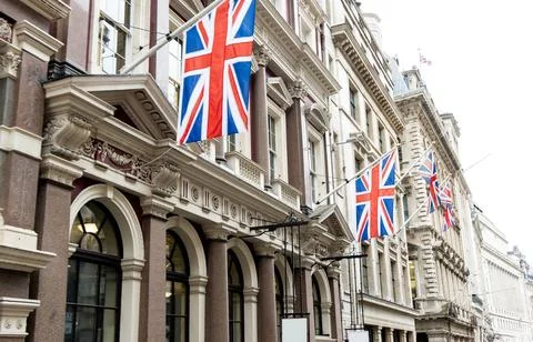 Union Jack Flags On The Side Of A Building To Show A British Residence Or Pri Stock Photos