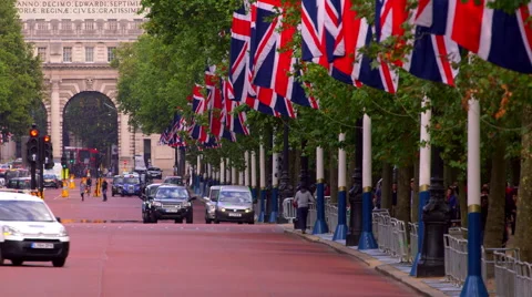 UNION JACK FLAGS TRAFFIC THE MALL LONDON ENGLAND Stock-Footage 67107739