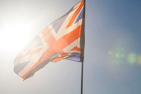 Union jack flying in the sky Stock Photos