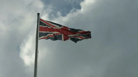 Union Jack MS against a cloudy sky 스톡 동영상 37016248