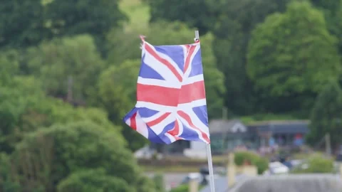 Union Jack, Union Flag, United Kingdom flag on wind Stockbeeldmateriaal 279074011