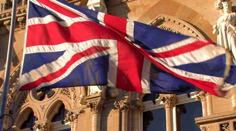 Union Jack in the Wind in Front of Town Guildhall Stock Footage 61484186
