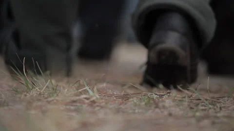 Union Re-enactor Soldier Boots marching with Muskets and flags in wilderness Stock Footage 170524207