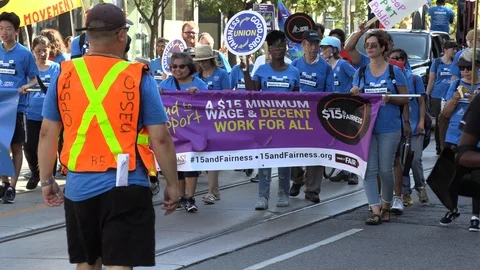 Union workers in labor day parade in Toronto Canada Stock Footage 94598689