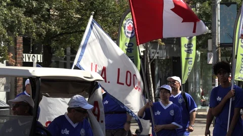 Union workers in labor day parade in Toronto Canada Stock Footage 94600431