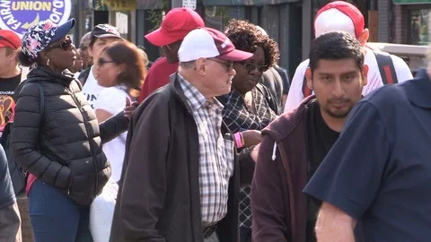 Union workers marching in solidarity for good job in Toronto labor day parade Stock Footage 79690339