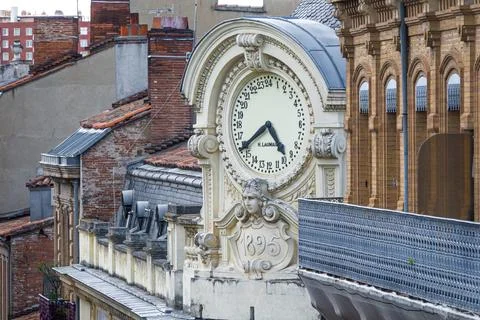 Unique 24 hours clock on a building, made in 1895. Toulouse, France Stock Photos