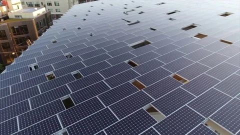 Unique 3-way solar panel array on commercial office building in Seattle, WA Stock Footage 83946817