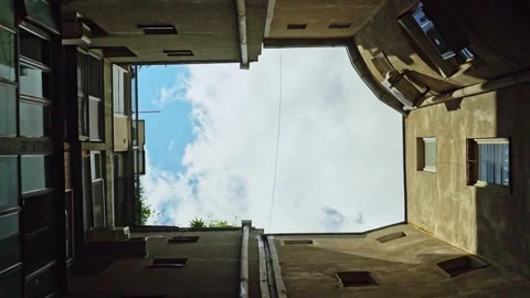 A Unique and Captivating Perspective of a Beautiful Courtyard Set Against a Stock Footage 282707236