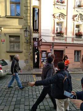 A unique and narrow perspective of a tiny alleyway in Prague Stock Photos