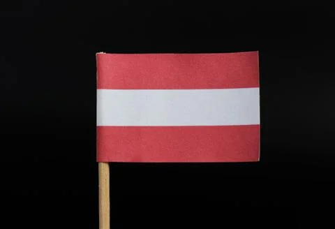A unique and very simple flag of Austria on toothpick on black background. A  Stock Photos