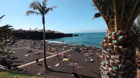 Unique Angle of Beautiful Black Sand Beach in Tenefire full of people. Stock Footage 151323670