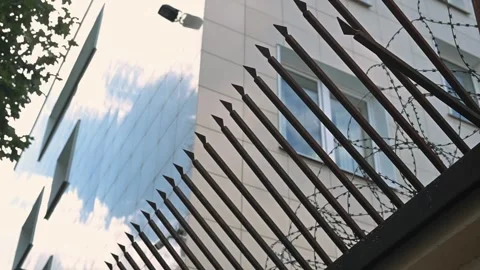Unique angles and reflections create an intriguing view of a building with a Stock Footage 345883711