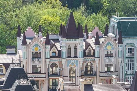 A unique architectural structure featuring Gothic elements, multiple levels,  Stock Photos